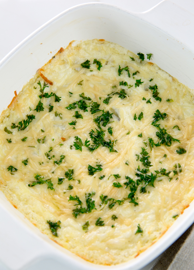 Vertical image of Baked Creamy garlic parmesan hot artichoke dip-3