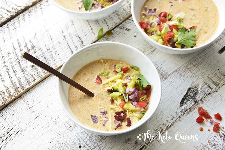 horizontal image of Keto Bacon Cheeseburger Soup with a spoon