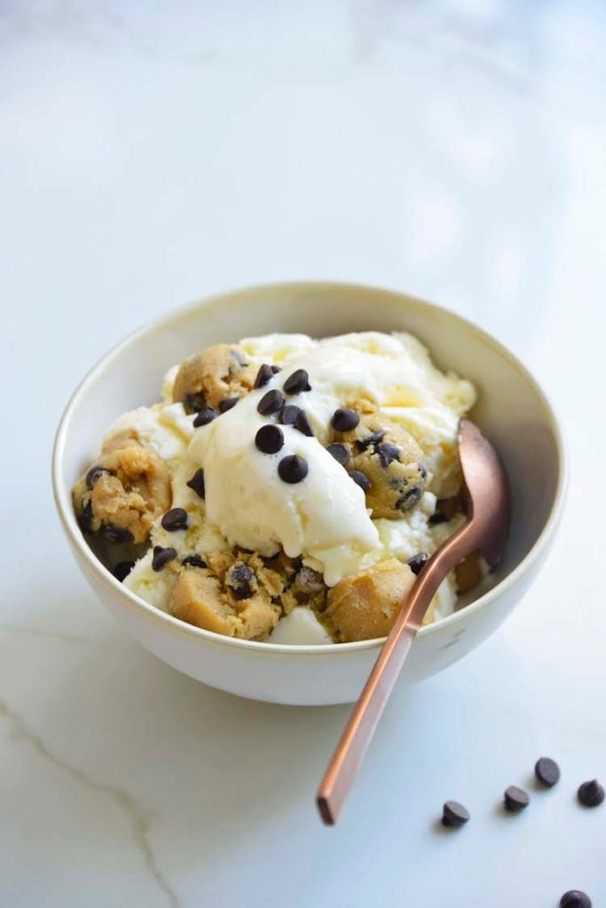 easy keto chocolate chip cookie dough ice cream in a bowl with a rose gold spoon