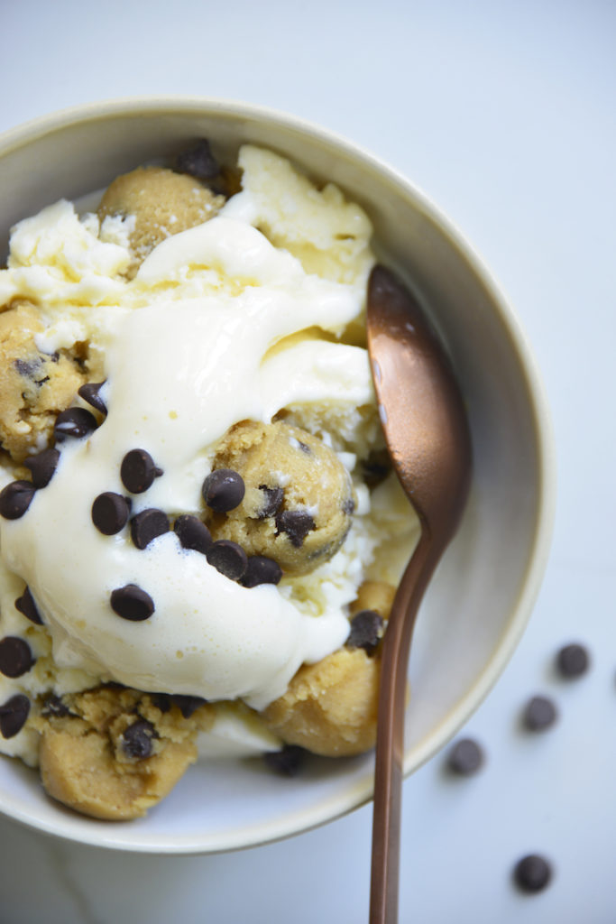 easy keto chocolate chip cookie dough ice cream in a bowl with a rose gold spoon