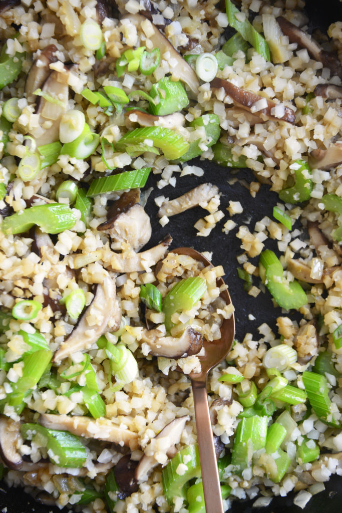 cauliflower fried rice closeup with a spoon