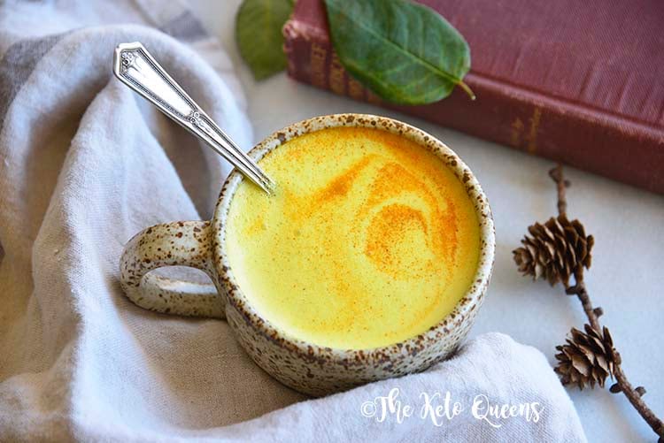 Close Up of Golden Milk in Mug with Spoon