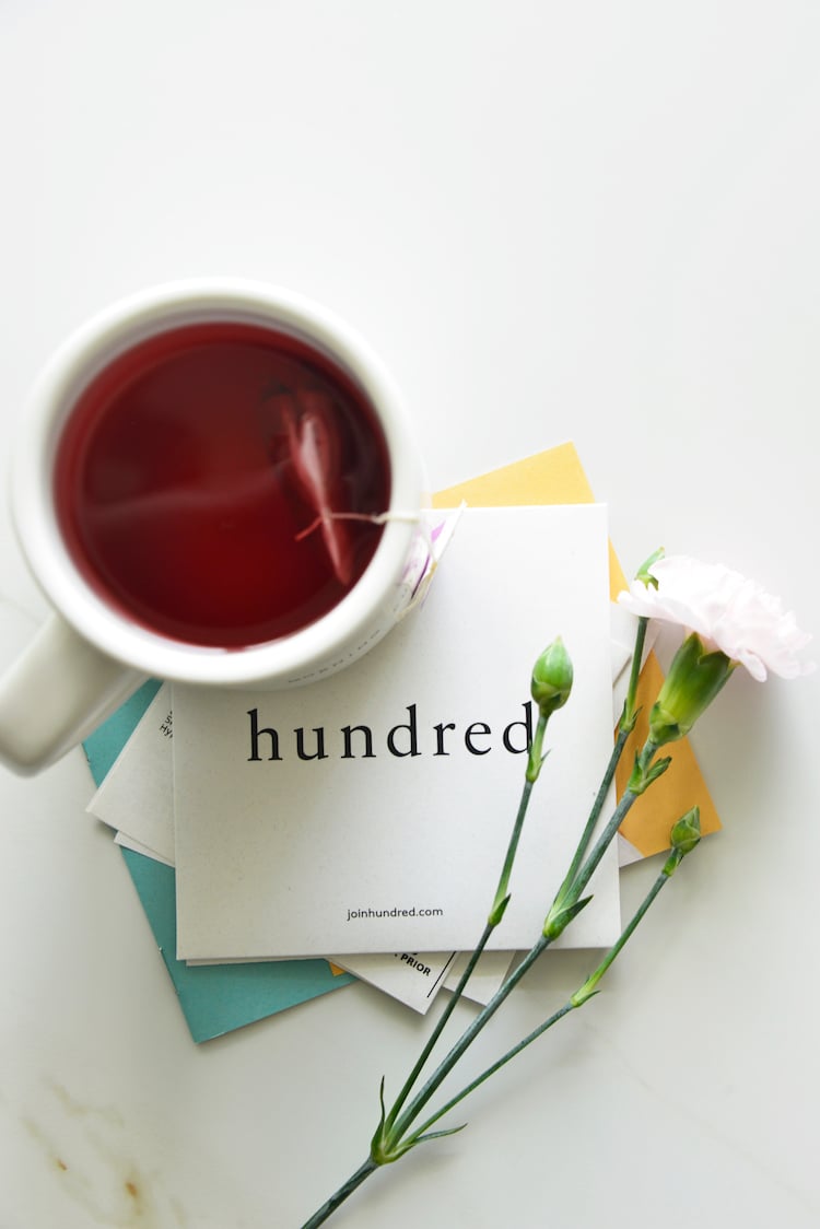 image of tea with carnations and hundred vitamins