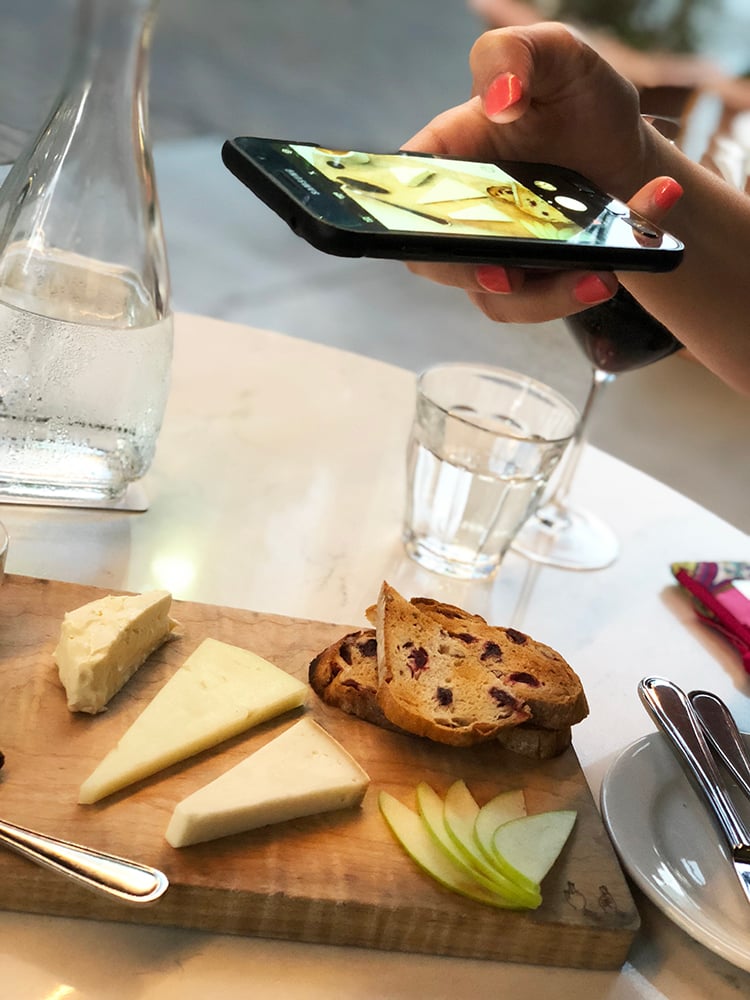 Taking Mobile Phone Picture of Cheese Board