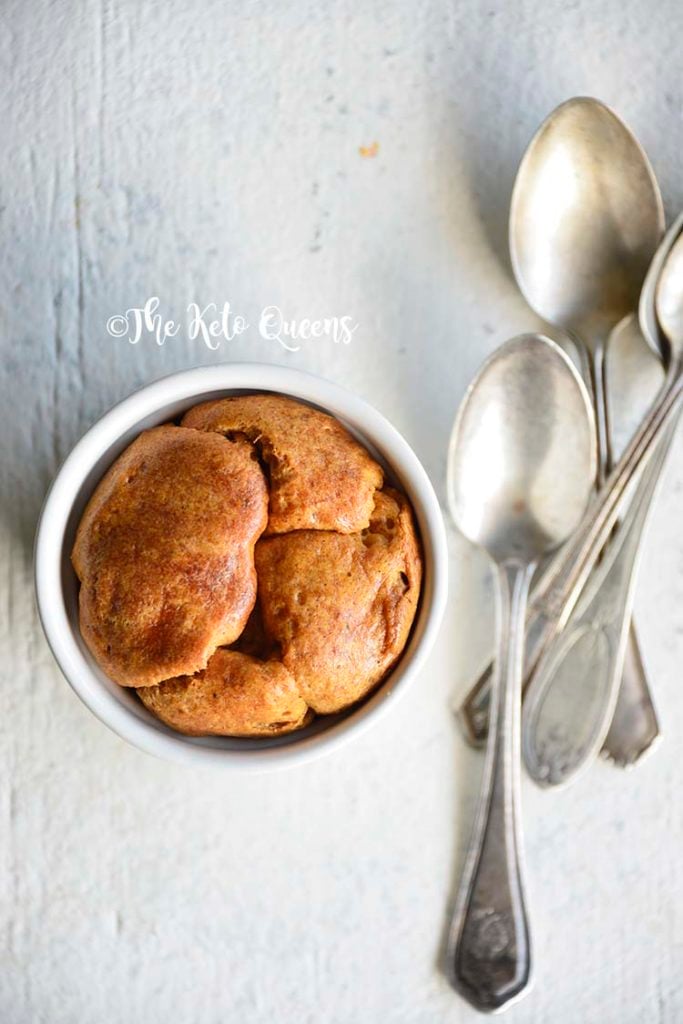 vertical image of Low Carb Brioche Bread with 3 spoons on a white background