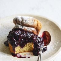 vertical image of Low Carb Brioche Bread filled with low carb blueberry sauce
