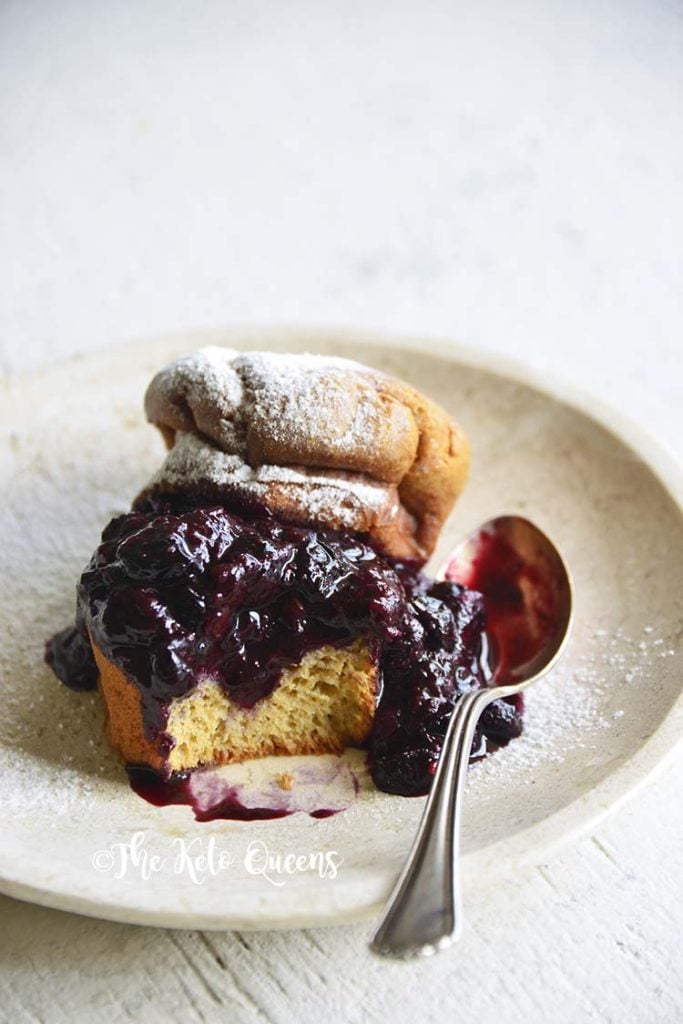 vertical image of Low Carb Brioche Bread filled with low carb blueberry sauce