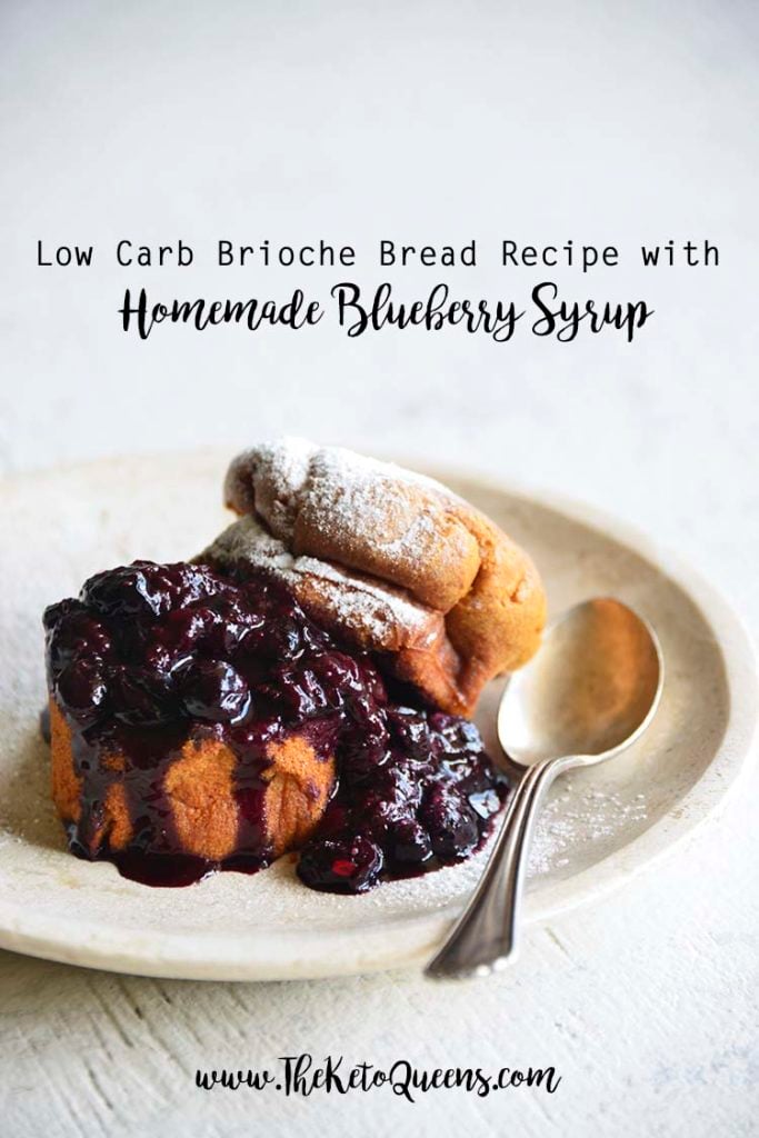Vertical image of Low Carb Brioche Bread with homemade low carb blueberry sauce with a spoon