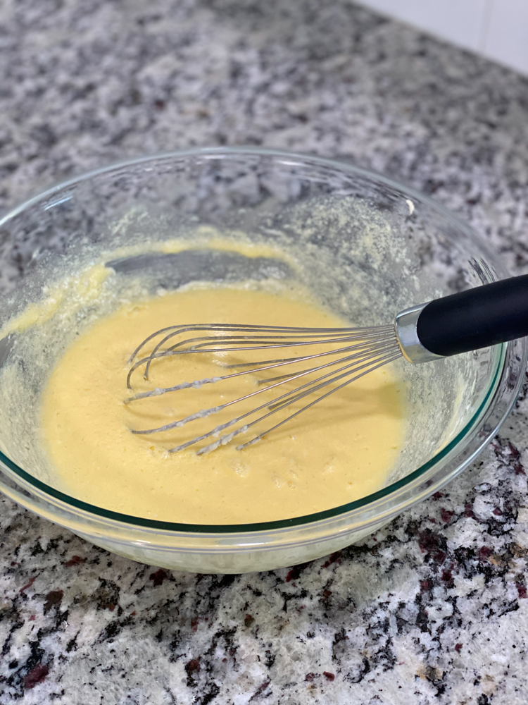 batter in clear bowl with whisk