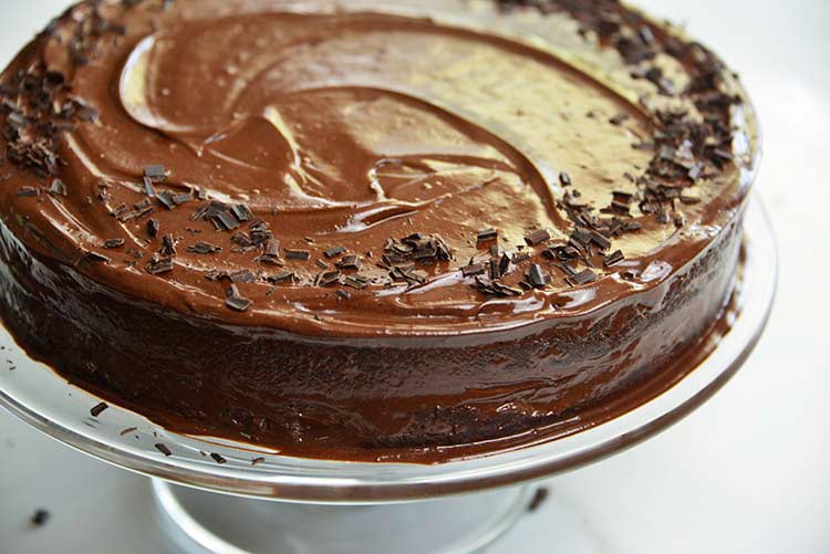 low carb flourless chocolate cake with frosting and sprinkles