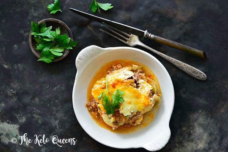 Low Carb Lasagna with Easy Meat Sauce and Cabbage Noodles on Metal Background