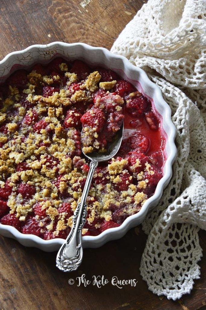 Low Carb Raspberry Crisp Recipe (Keto Fruit Dessert) on Wooden Table