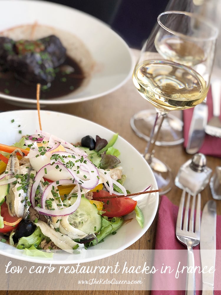 Nicoise Salad and Beef Burgundy with White Wine at Restaurant in France