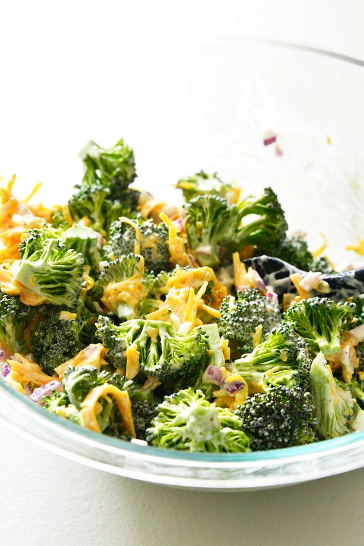 Mixing Broccoli Salad with Dressing