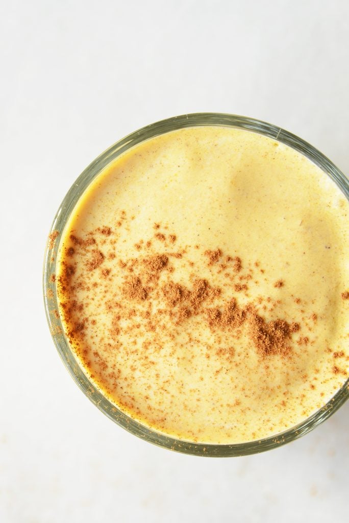 keto pumpkin smoothie in a clear glass