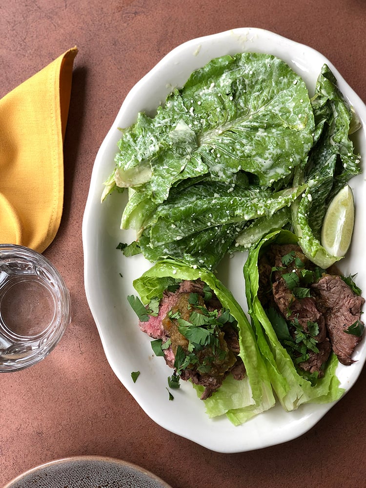 reyes mezcaleria tacos on lettuce leaves