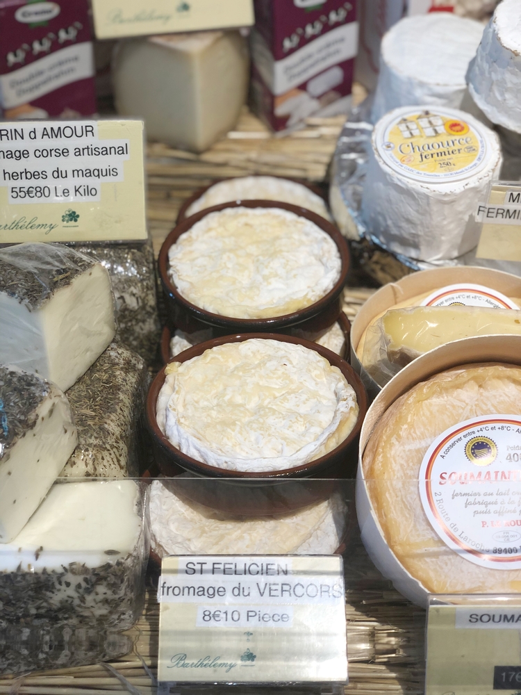 Saint Felicien Cheese on Shelf in Paris Cheese Shop