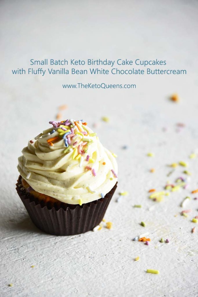 vertical image of a keto cupcake - vanilla cupcake with white chocolate buttercream frosting with sprinkles and text