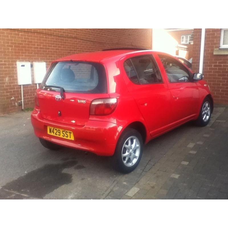 toyota yaris 5dr 1.3 cdx in red 95k mileage look !!!