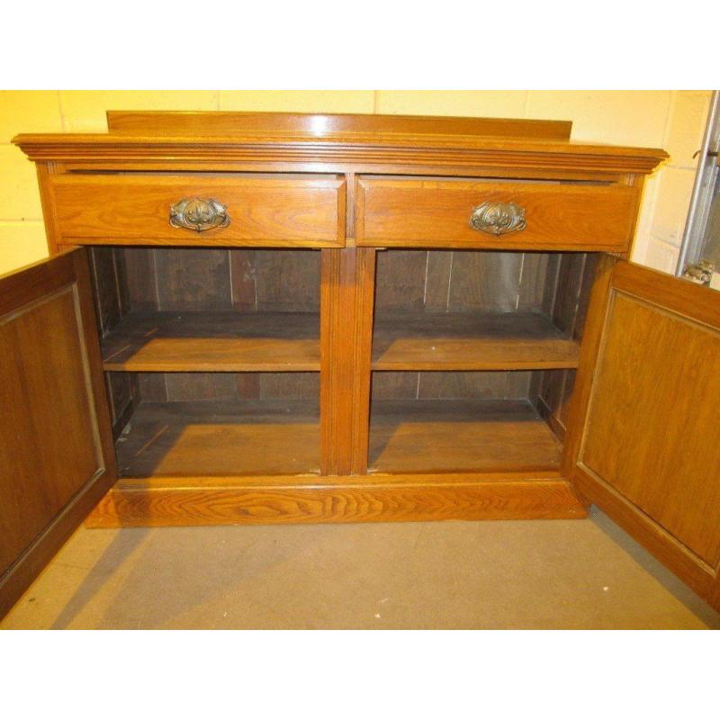 VINTAGE SOLID OAK SIDEBOARD WITH CARVED DOORS AND ART NOUVEAU HANDLES FREE DELIVERY