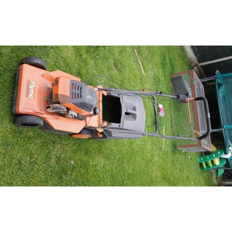 Lawnmower petrol self propelled flymo