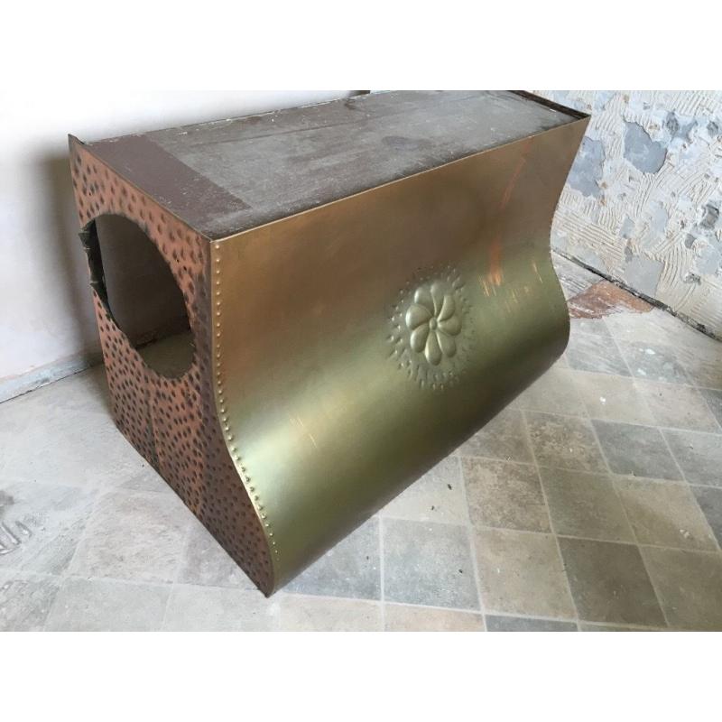 Cooker hood country style made of copper with embossed flower pattern on front