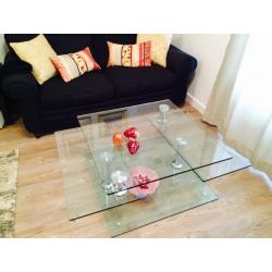 Glass coffee table - in excellent condition, like new