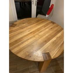 Solid oak round 6 seater dining table (no chairs)